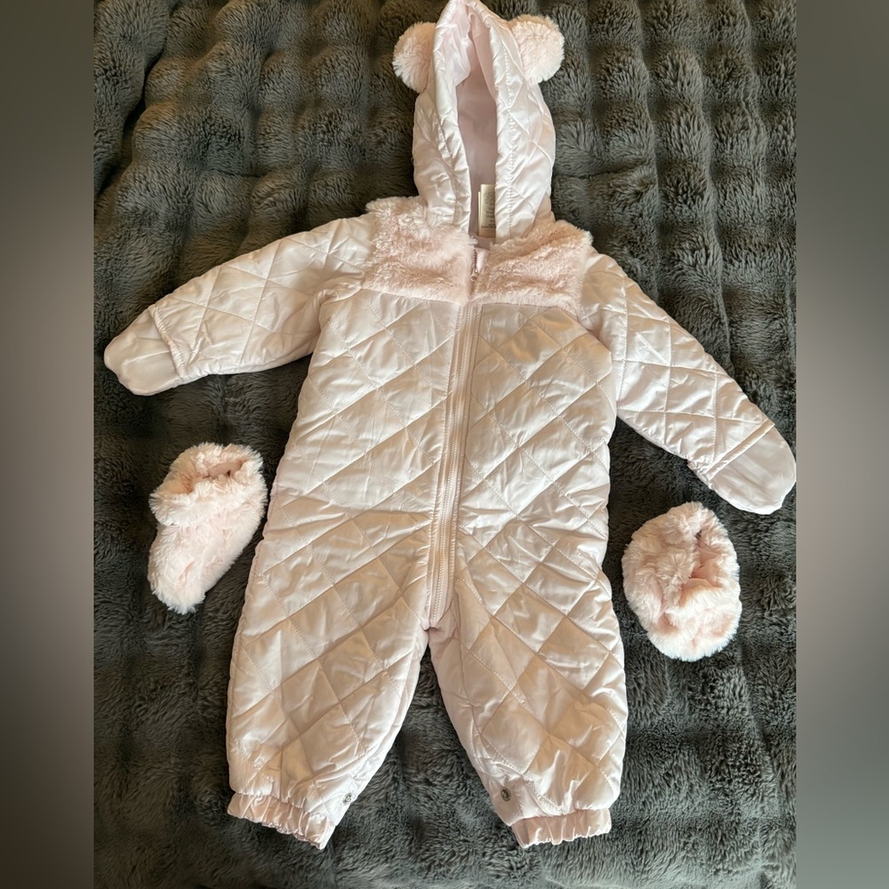 A head-to-toe water resistant bodysuit by first impressions light pink size 12M